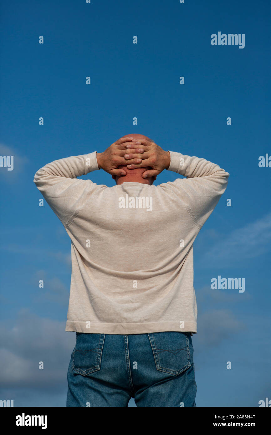 Senior man looking out Stock Photo