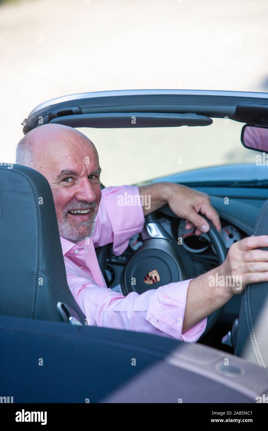 Old man sports car hires stock photography and images Alamy
