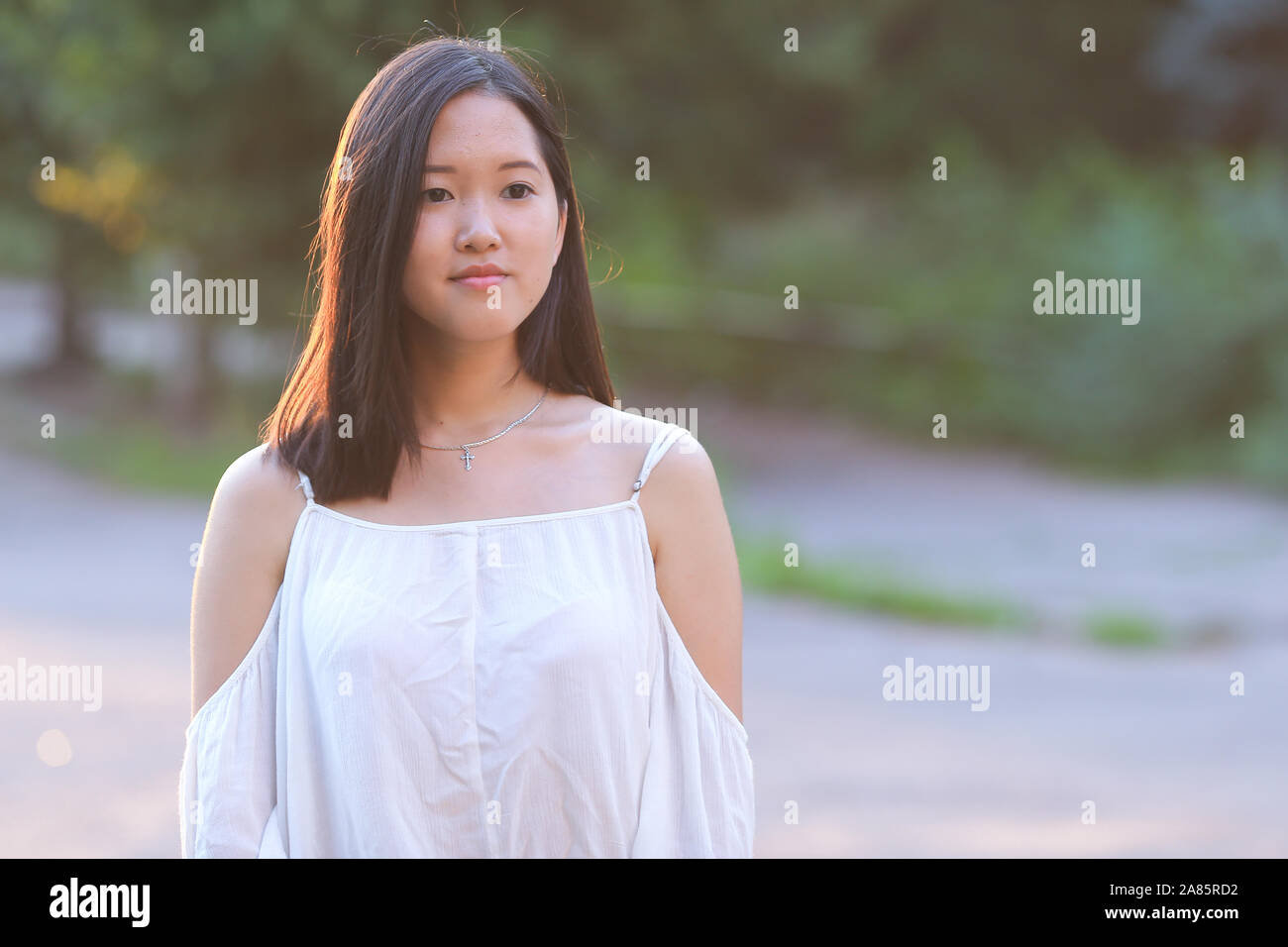 Asian beautiful girl portrait looking at the camera Stock Photo - Alamy