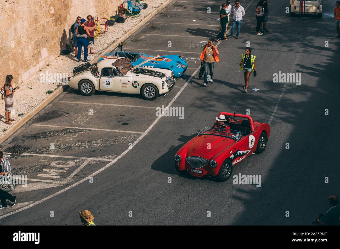Mdina, Malta - 2016.10.08:  Malta Classic Grand Prix, red Austin Healey 1954 100 BN1 Stock Photo
