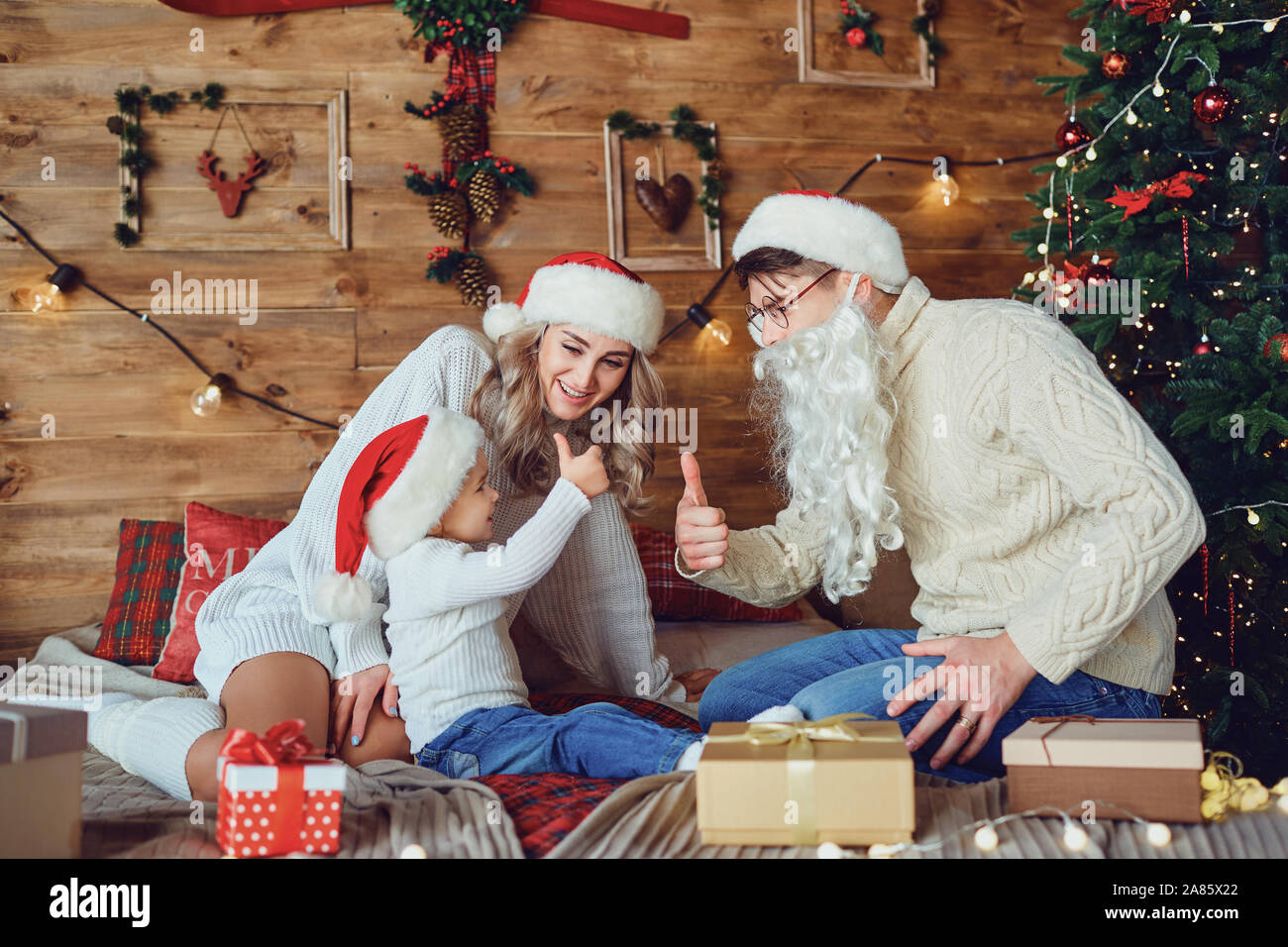 Happy family playing in the room at Christmas Stock Photo