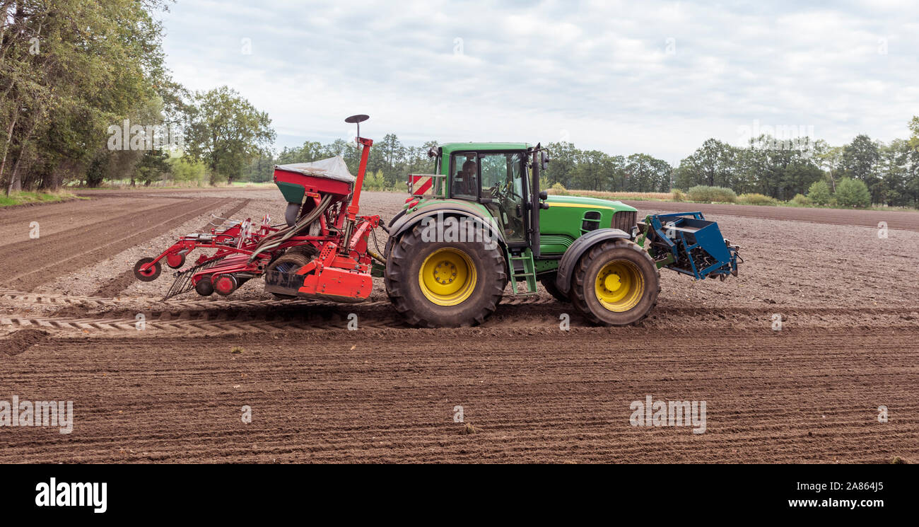 Land Preparation With Tractor, Tractor Plows A Field, Agriculture Modern  Method Stock Photo, Picture and Royalty Free Image. Image 20428550.