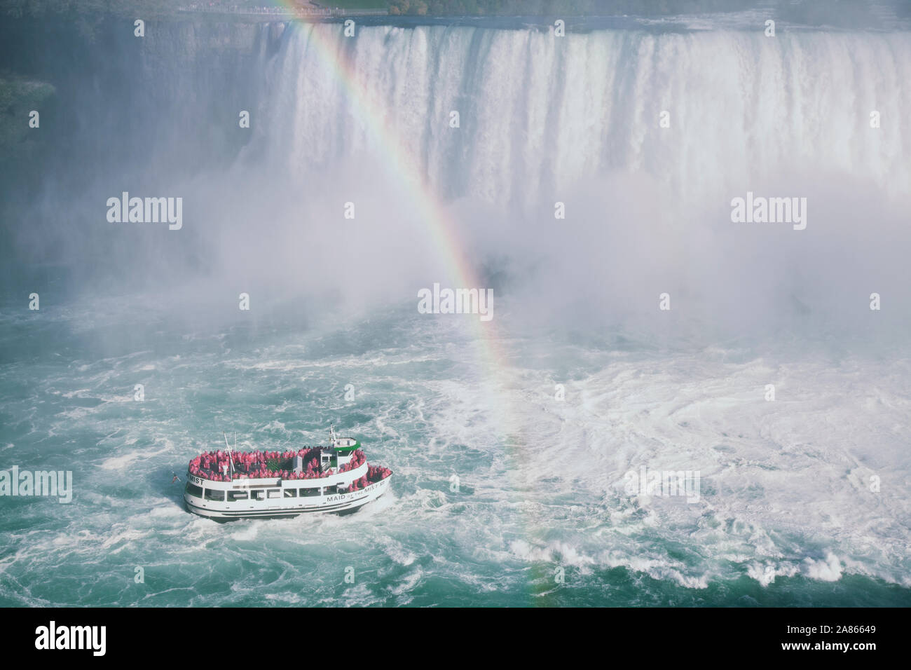 OCTOBER 20, 2019-NIAGARA FALLS, CANADA: The Maid of the Mist boat ride takes passengers close to the Horseshoe Falls in Niagara Falls Canada with a ra Stock Photo