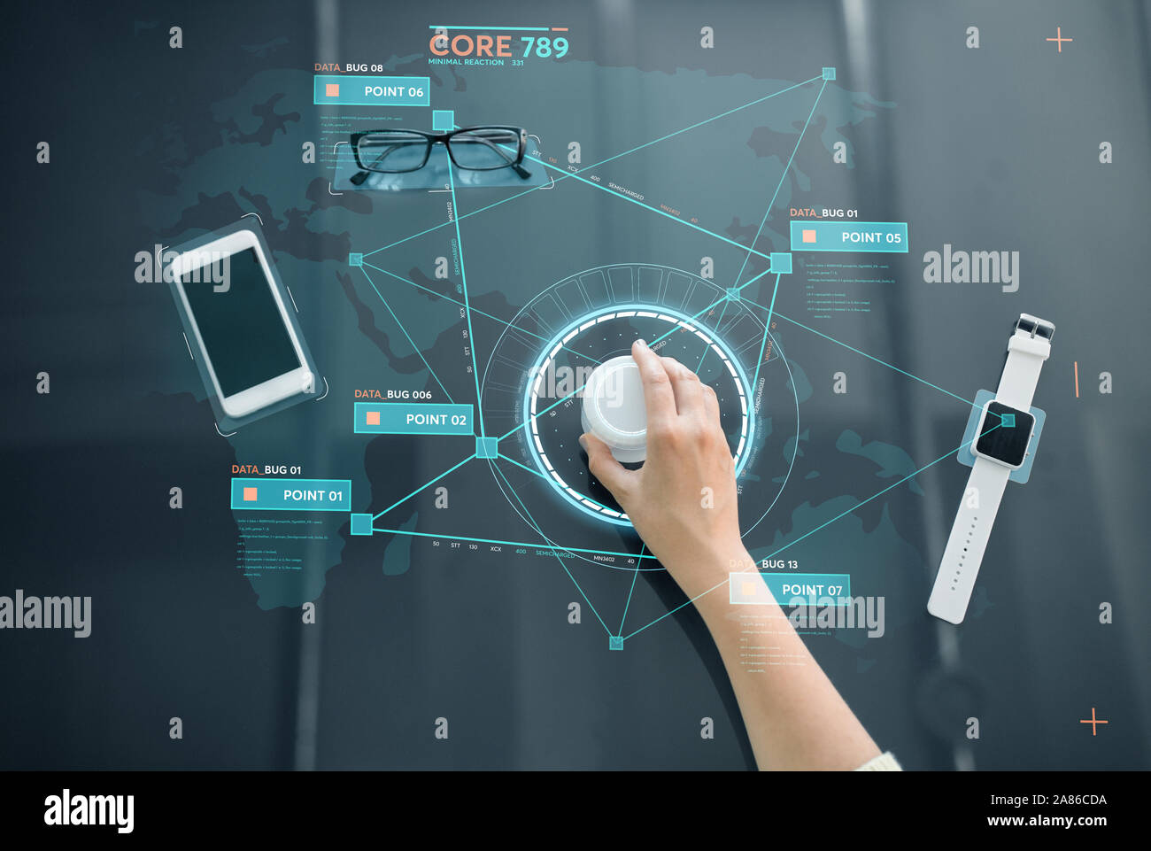 hand with control knob on interactive panel Stock Photo