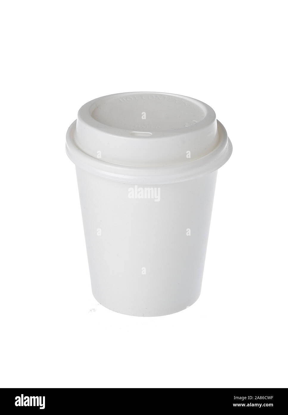 Disposable paper cup with closed plastic lid isolated on white. Stock Photo