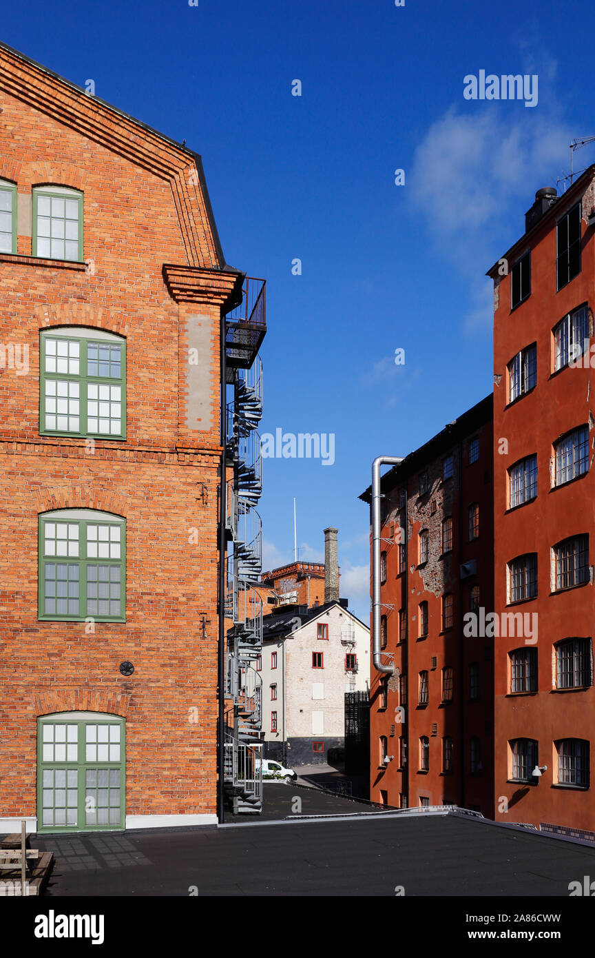 Old factory buildings in an industrial landscape. Stock Photo