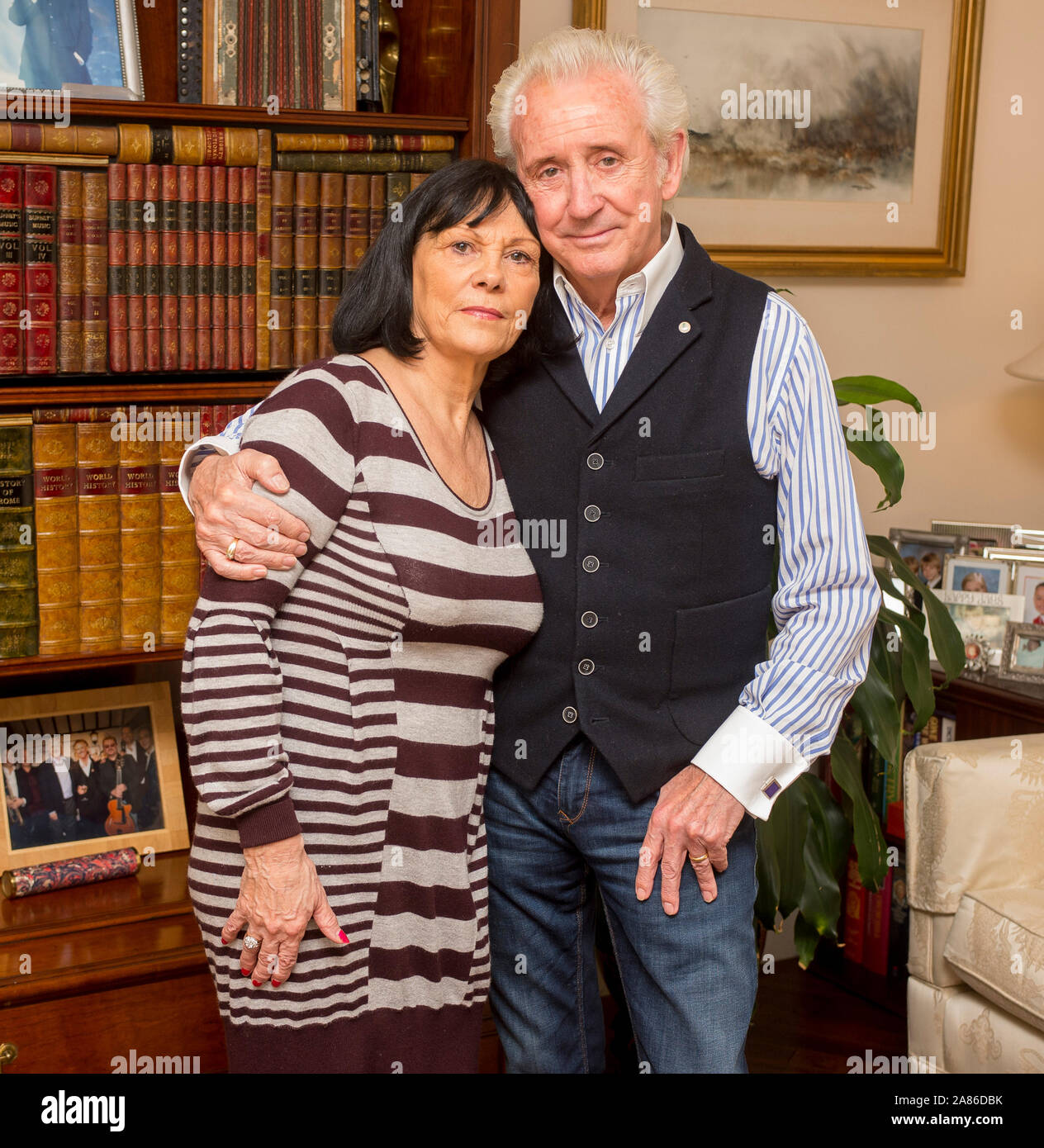 Singer Tony Christie with his wife Sue who were left terrified after their tour bus was attacked by gang of armed migrants at petrol station in Dunkirk. Stock Photo