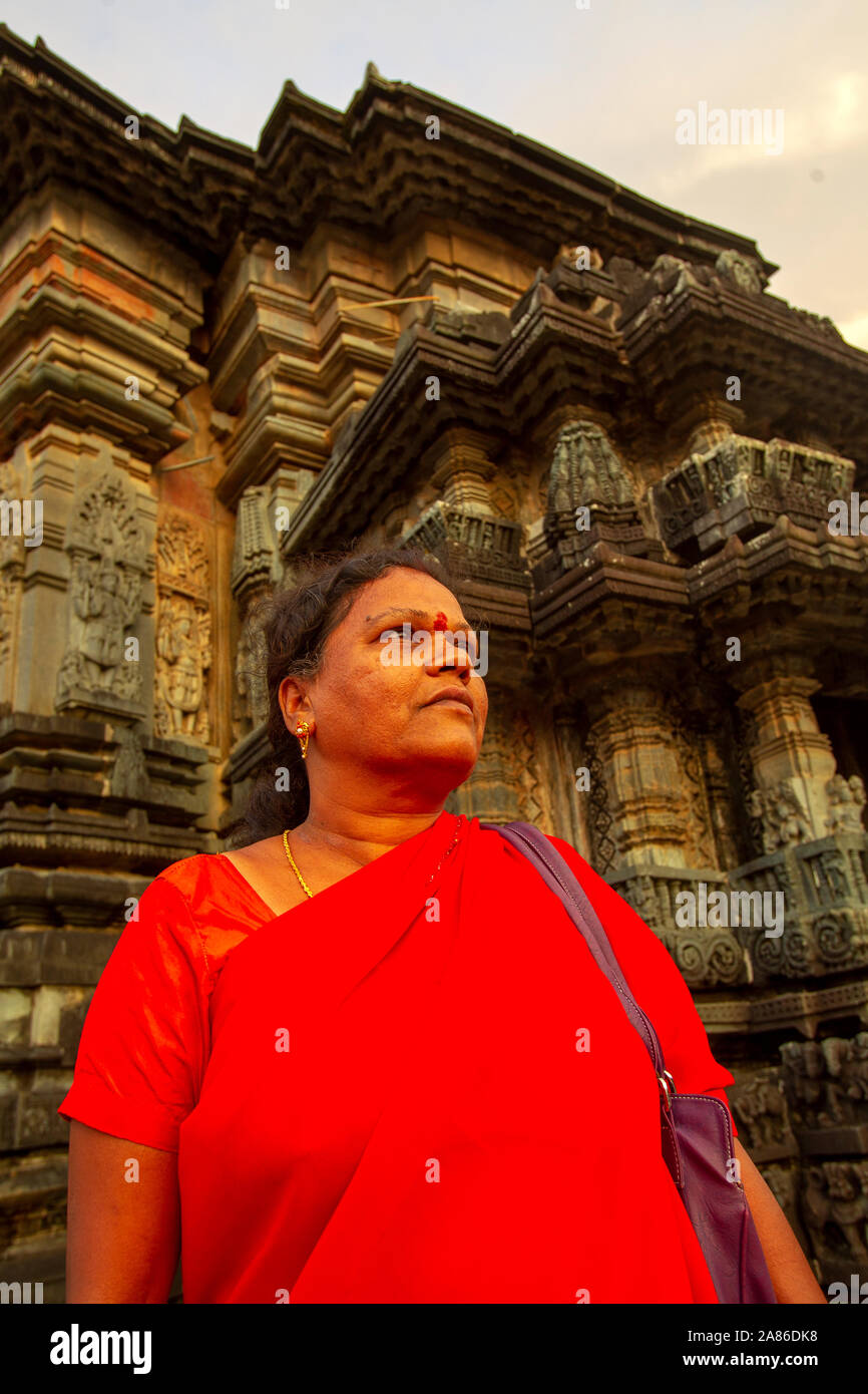 Indian woman visiting Chennakeshava Temple at Belur town, Karnataka, India Stock Photo