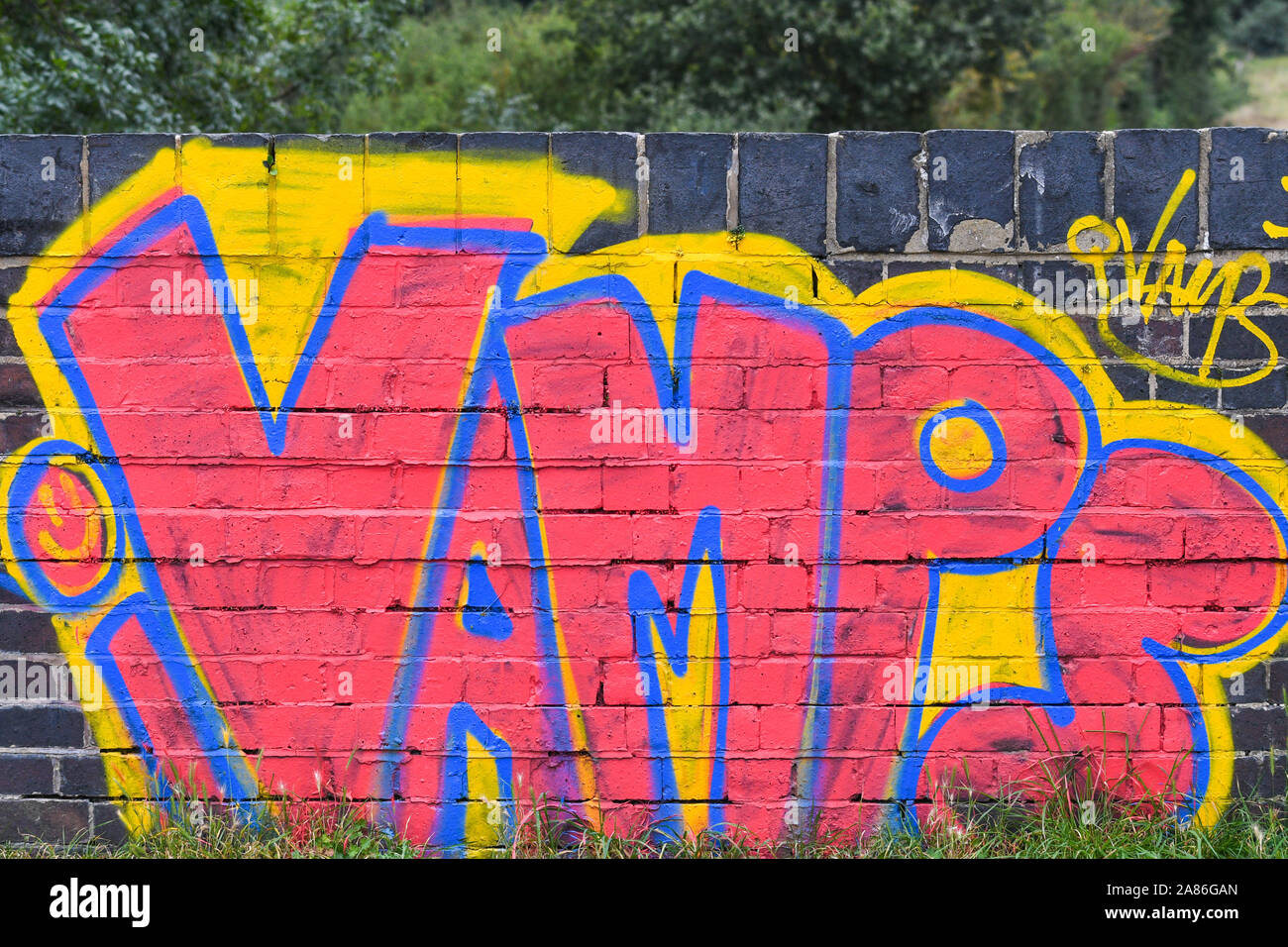 vamps graffiti on a brick wall Stock Photo