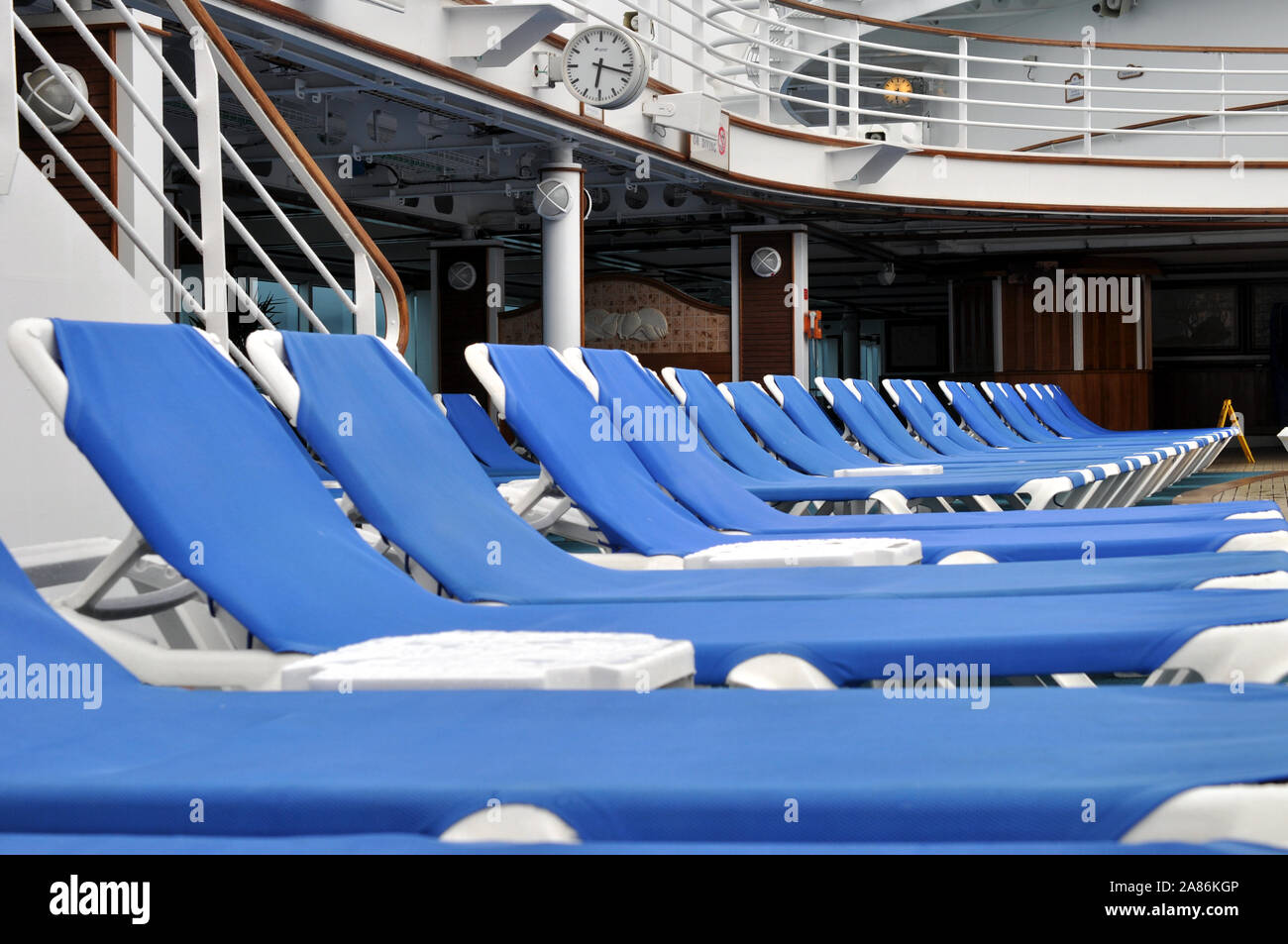 Deck chairs lined up on the deck of the Crown Princess Cruise Ship Stock Photo Alamy