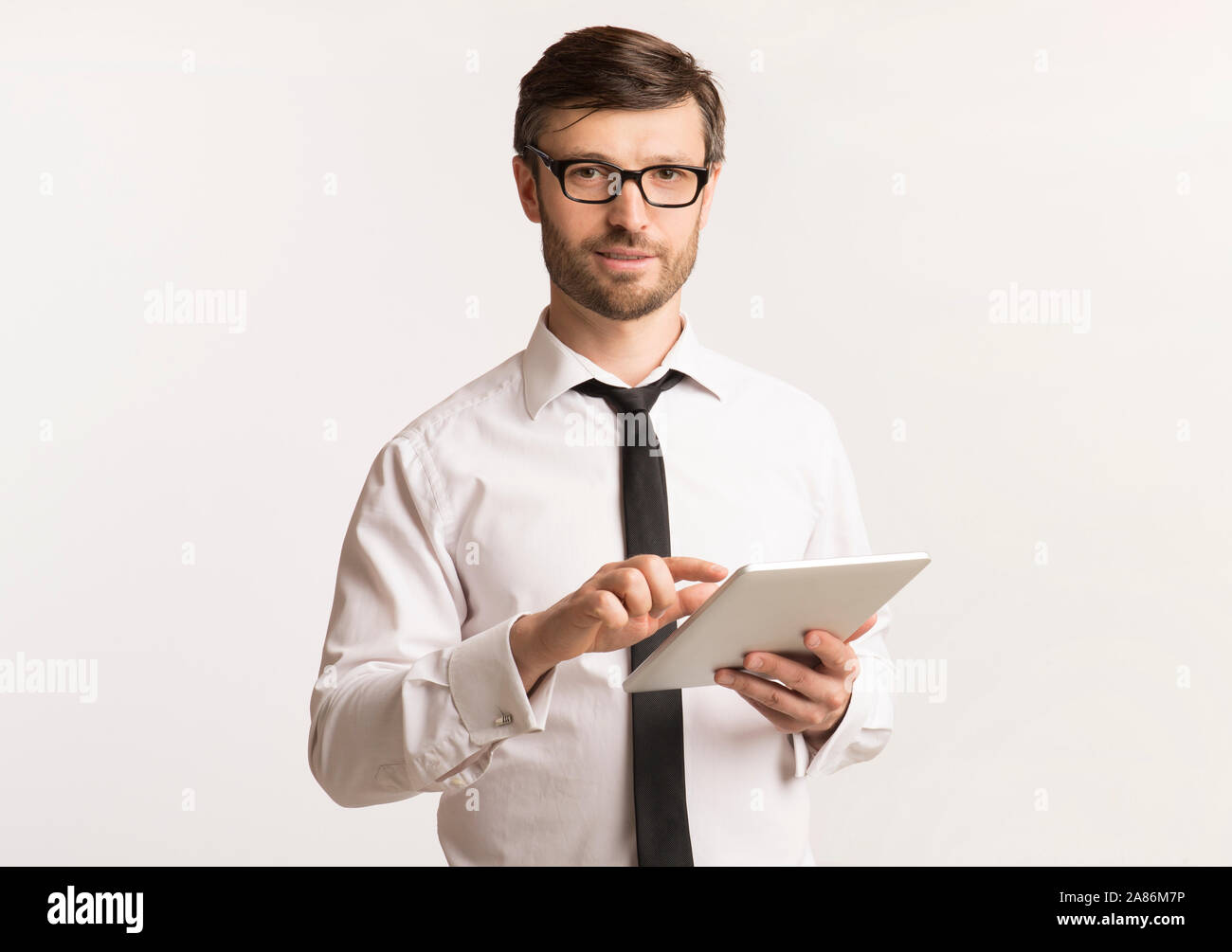 Employee using computer hi-res stock photography and images - Alamy