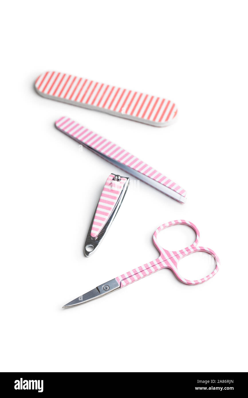 Pink manicure tools. Nail scissors and accessories isolated on white background. Stock Photo