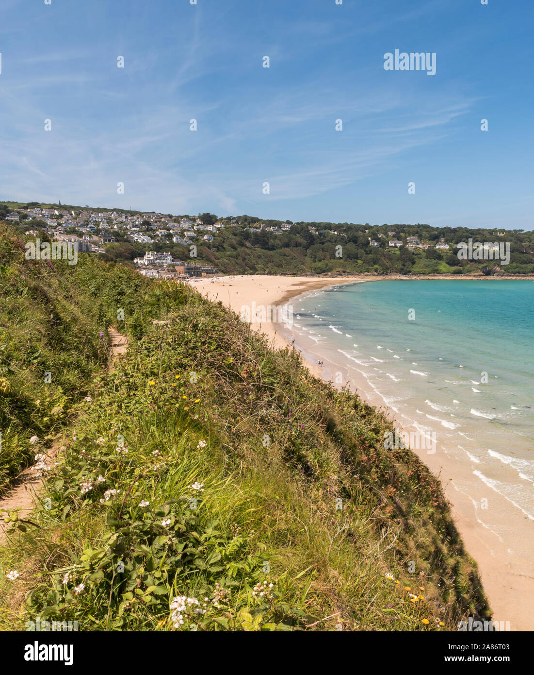 Coast Path Walking Between St Ives And Hayle Summer In Cornwall Stock coast-path-walking-between-st-ives-and-hayle-summer-in-cornwall-stock