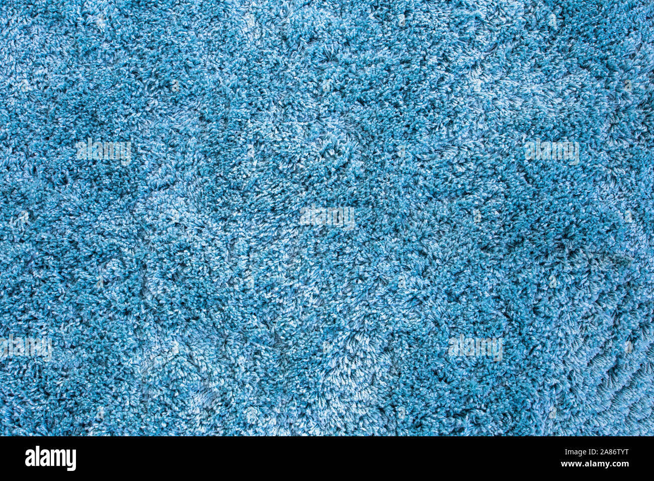 Blue fur carpet background texture Microfiber texture, light blue