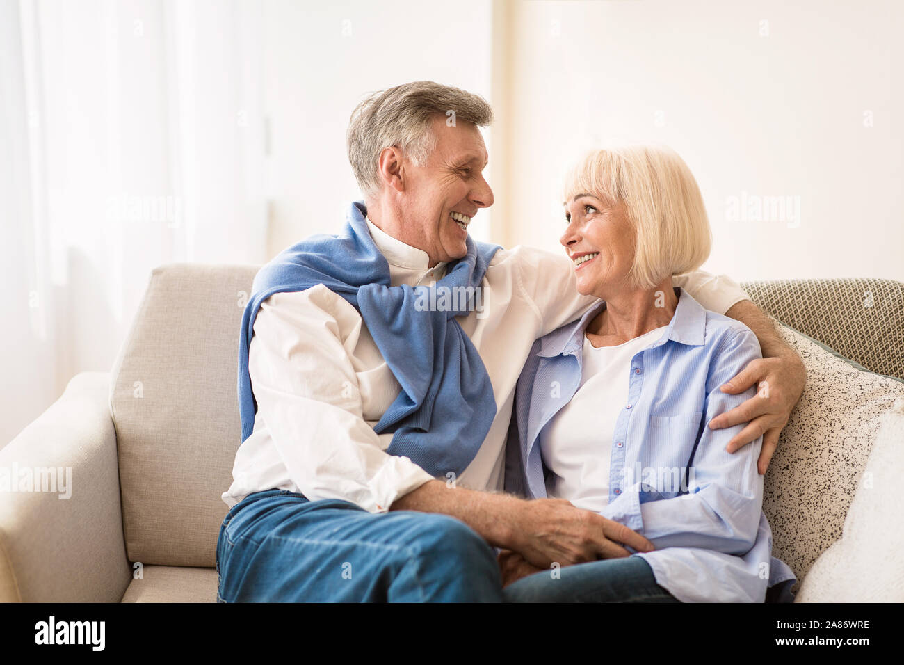Smiling mature couple looking at each other with affection Stock Photo