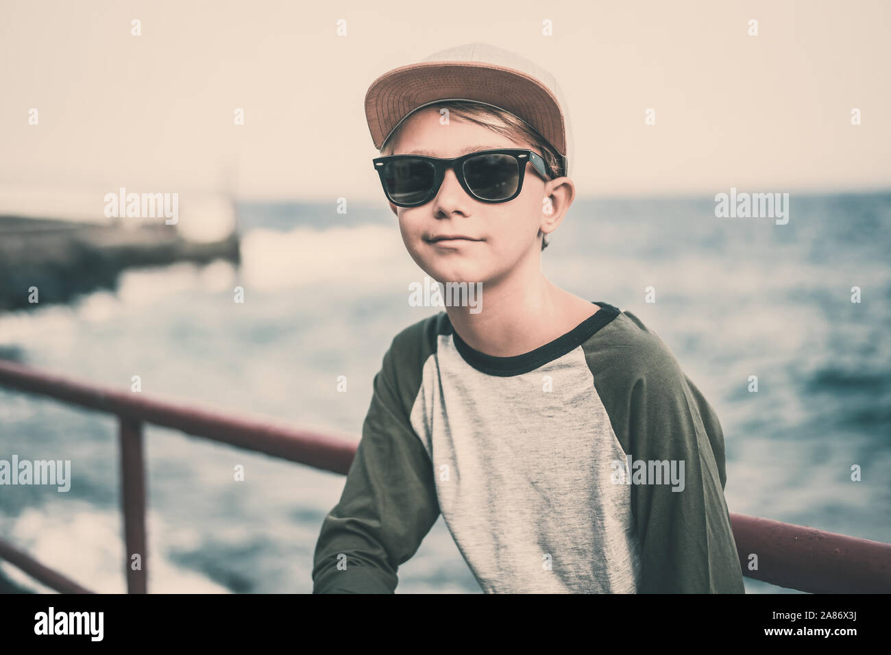 Happy peaceful teen boy hi-res stock photography and images - Alamy