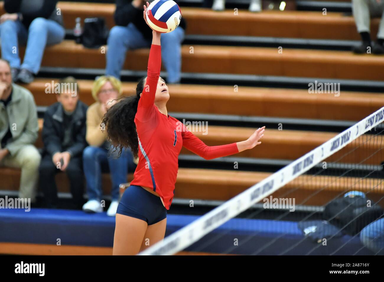 Player attempting to deliver a kill shot to end a prolonged volley. USA. Stock Photo