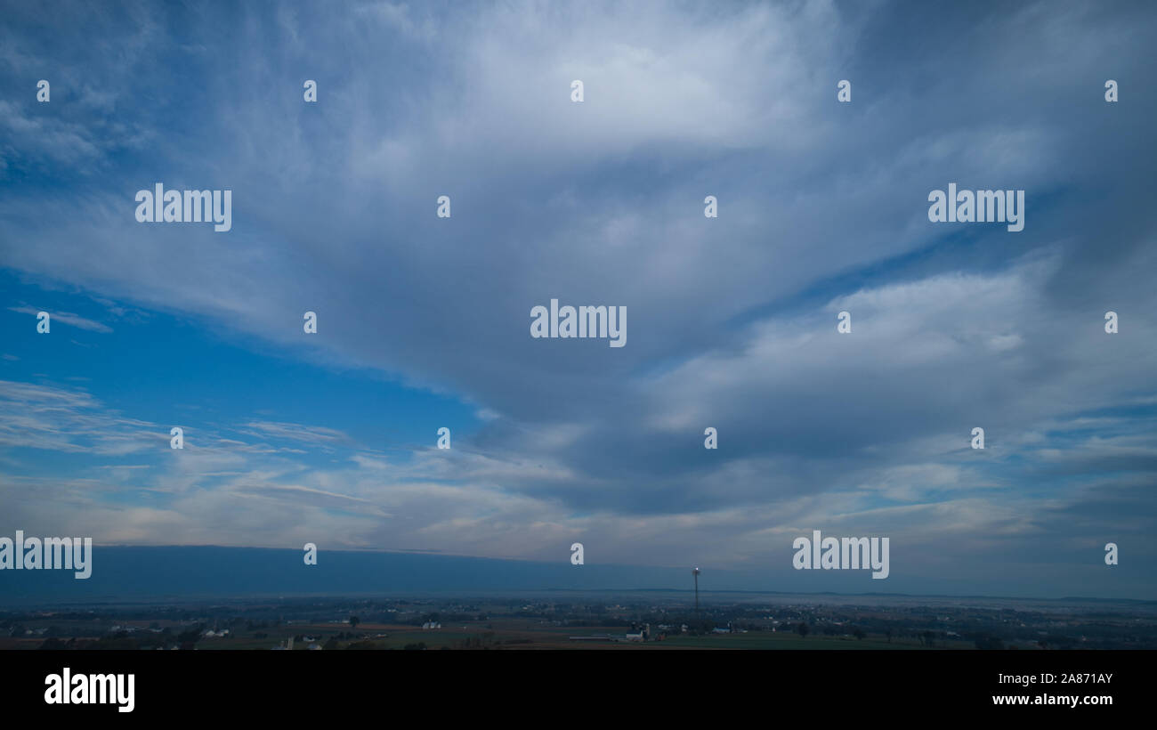 Aerial View of a Late Afternoon Sun With Partly Cloudy Blue Sky Over ...
