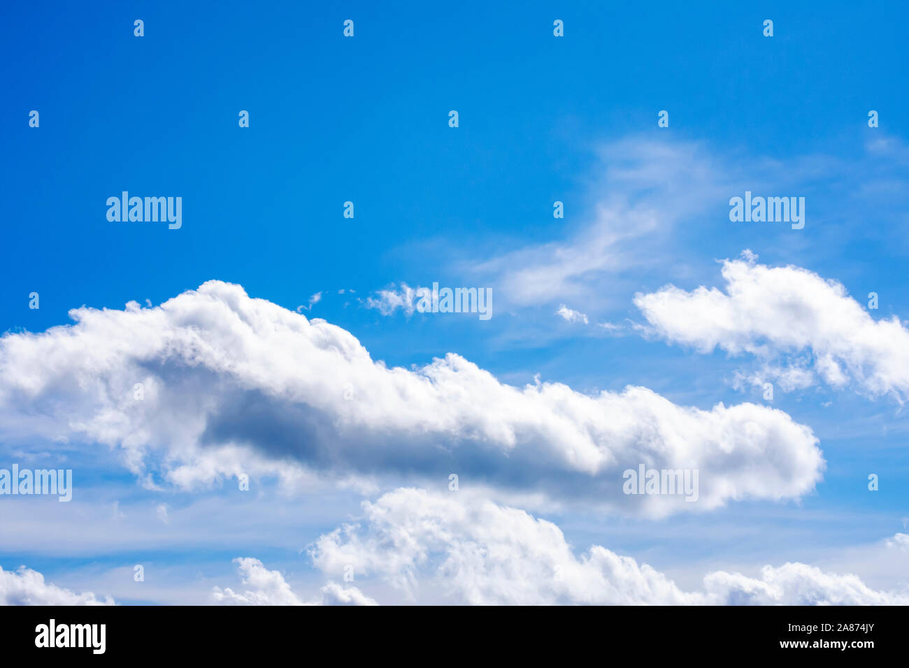 White Clouds on a Sunny Day Stock Photo