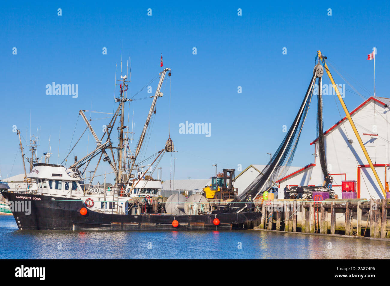 Commercial fishing net boat hi-res stock photography and images - Alamy
