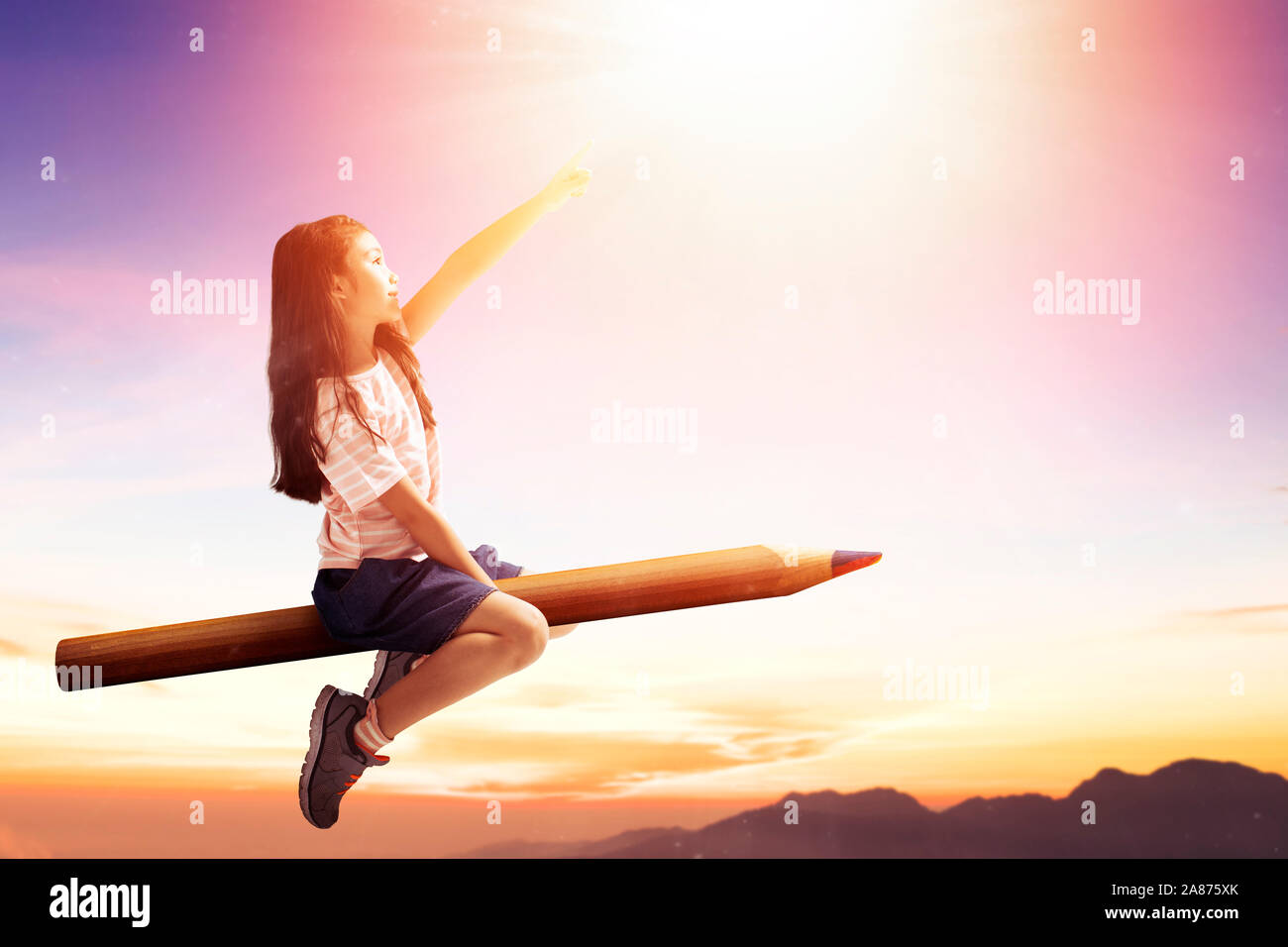 Happy Little Girl On Pencil And Flying In The Sky Stock Photo Alamy Happy Little Girl On Pencil And Flying In The Sky Stock Photo Alamy