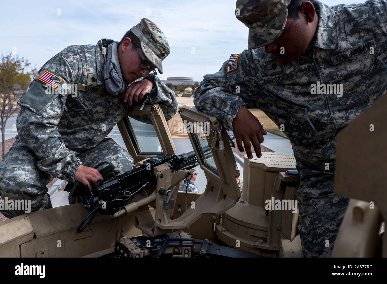 El Paso, Texas, USA. 6th Nov, 2019. SPC. DOMINIQUE STONE, left, and SPC. PAUL LOZOLLA, right, of the 3rd Armored Brigade Combat Team, 1st Armored Division, stand on top of an M1A2 Abrams Tank on display during the celebration of Torch Week at Fort Bliss in El Paso, Texas. The celebration commemorates the United States' invasion of North Africa during Operation Torch on November 8 through November 16, 1942 during World War II. Credit: Joel Angel Juarez/ZUMA Wire/Alamy Live News Stock Photo