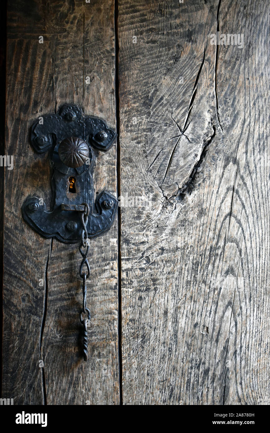 A close up of an old wooden door and lock Stock Photo - Alamy