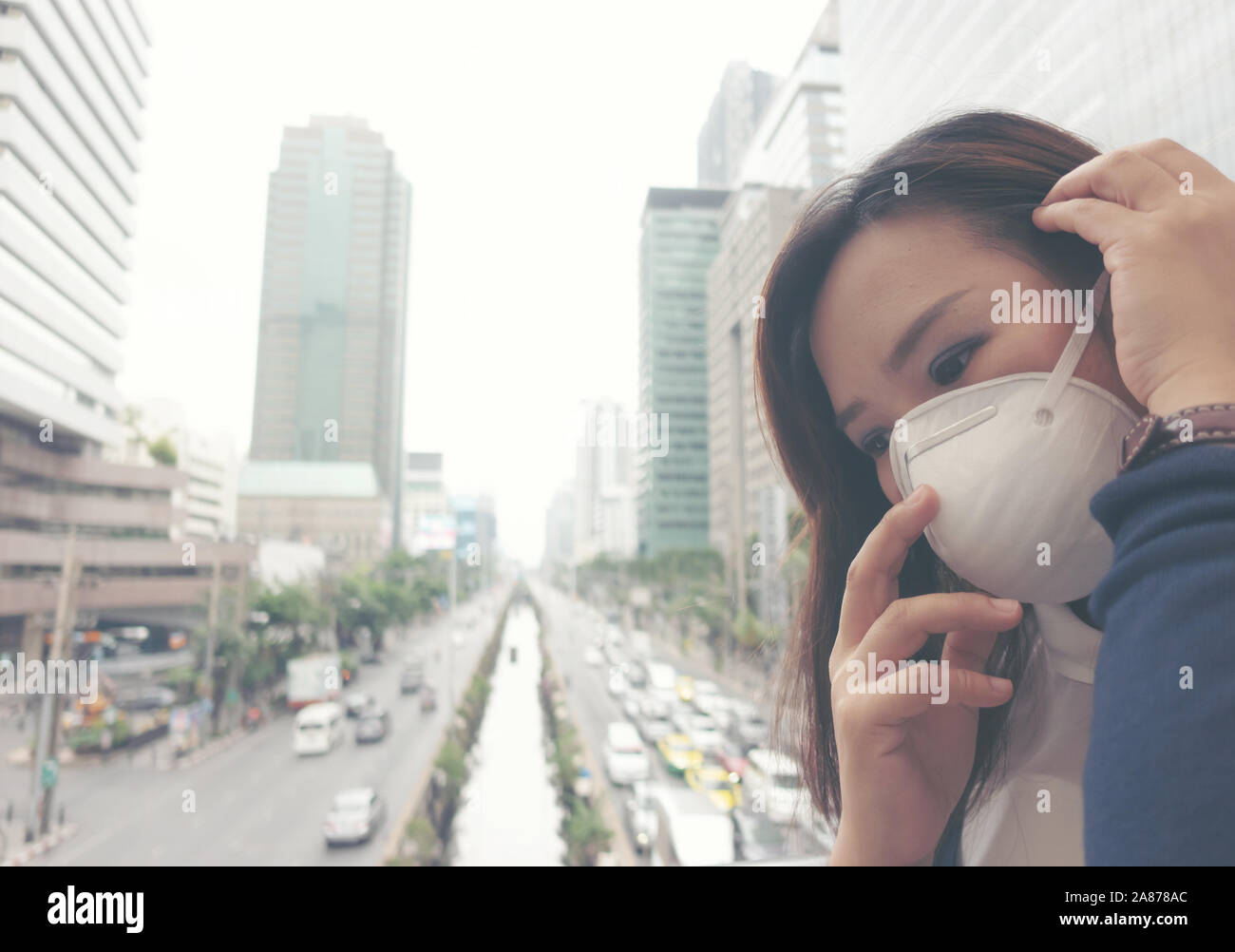 woman wearing protective mask in the city street, Bangkok thailand Stock Photo