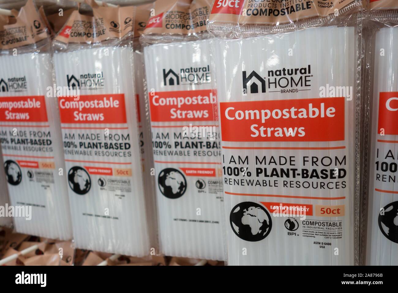 A display of plantbased compostable straws for sale in a grocery store