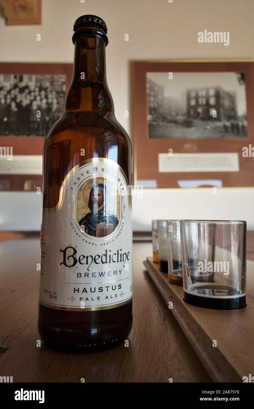 A bottle of Benedictine Brewery Haustus pale ale, next to an almost