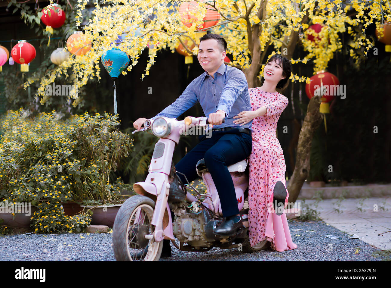 Photo Of A Vietnamese Couple Wearing Traditional Clothes Stock Photo
