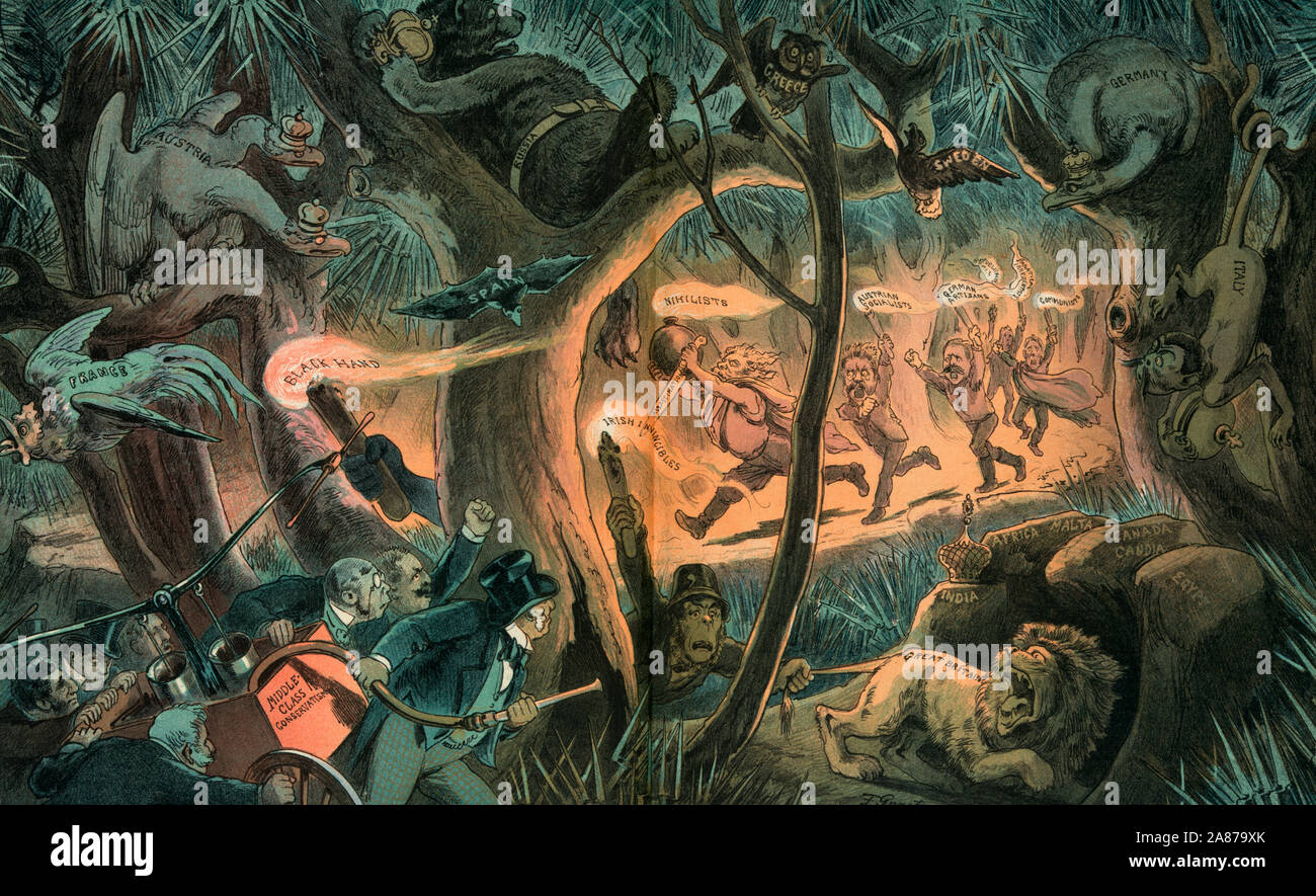 The coming conflagration in the European forest -  Illustration shows a scene in a dark forest with a group of men labeled 'Irish Invincibles, Nihilists, Austrian Socialists, German Artisans, Republicans, Fanatical Irredentists, and Black Hand' carrying torches or flaming sticks of dynamite and bombs, disturbing the slumber of various forest creatures labeled 'France, Austria, Russia, Spain, Greece, Sweden, Germany, and Italy' and the British Lion heading for its lair labeled 'India, Africa Malta, Canada, and Egypt'. A group of businessmen with a firefighter's water pump labeled 'Middle Clas Stock Photo