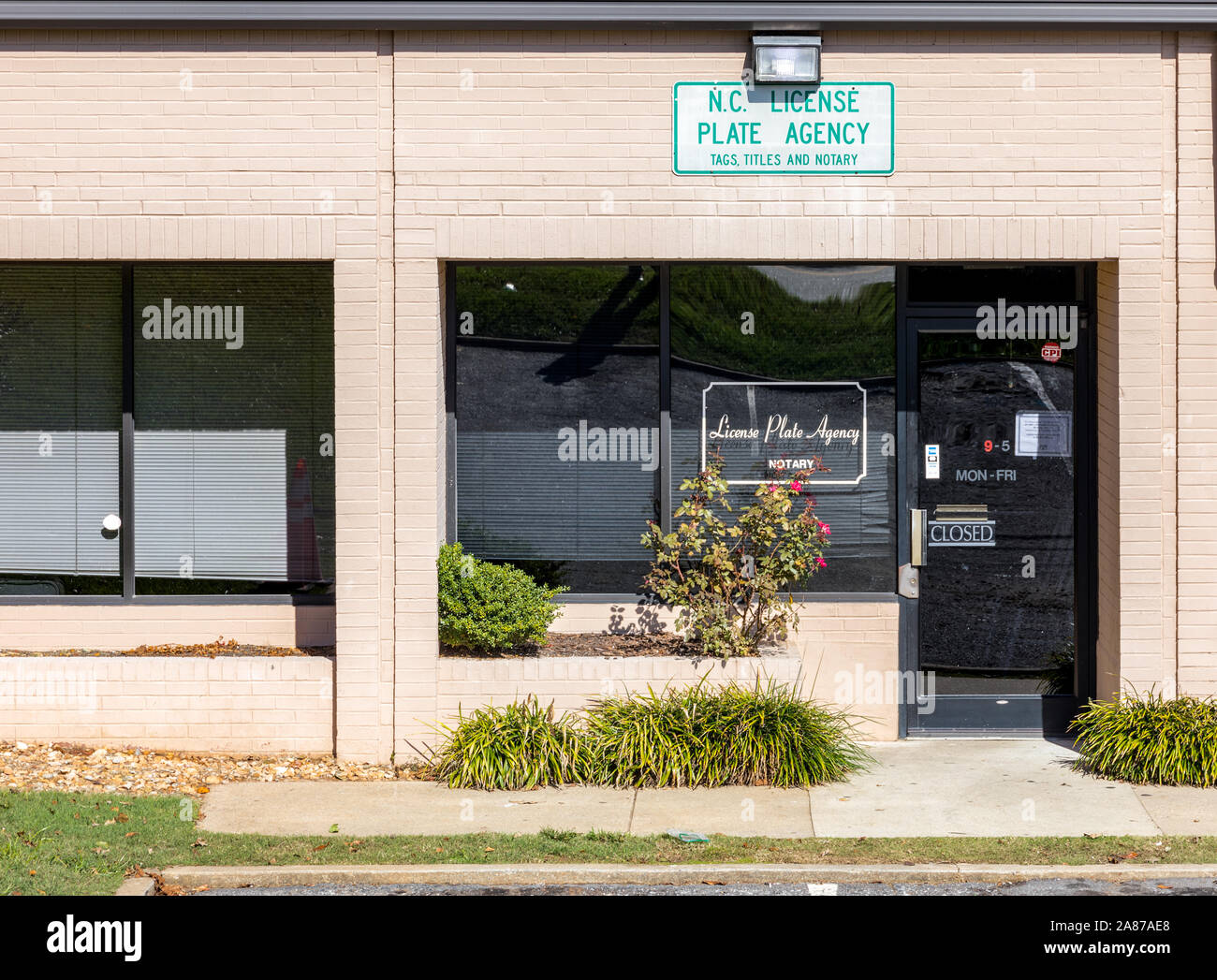 HICKORY, NC, USA-2 NOV 2019: North Carolina Vehicle License Plate Agency store front. Stock Photo