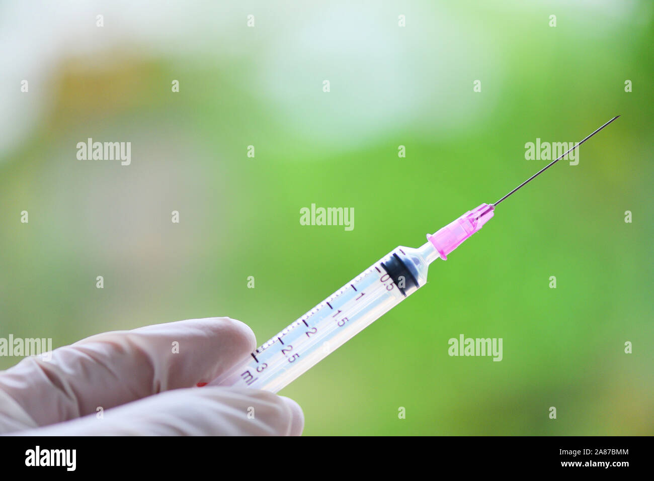 Syringe medication injection and needle in hand nurse for giving