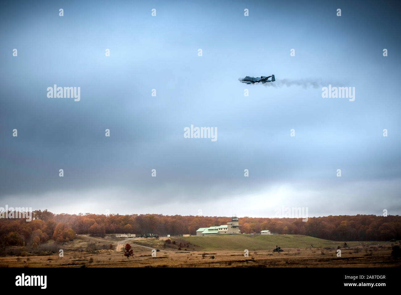 Joint Terminal Attack Controllers from the Latvian National Armed Forces conduct close air support training with A-10 Thunderbolt II aircraft assigned to the 107th Fighter Squadron, Selfridge Air National Guard Base, Mich., at Grayling Aerial Gunnery Range in Waters, Mich., October 29, 2019.    Michigan and Latvia have been linked under the U.S. National Guard Bureau's State Partnership Program since 1993. The collaboration between JTACs in the Latvian National Armed Forces and the Michigan Air National Guard has been one of the most productive examples of bilateral defense cooperation in the Stock Photo