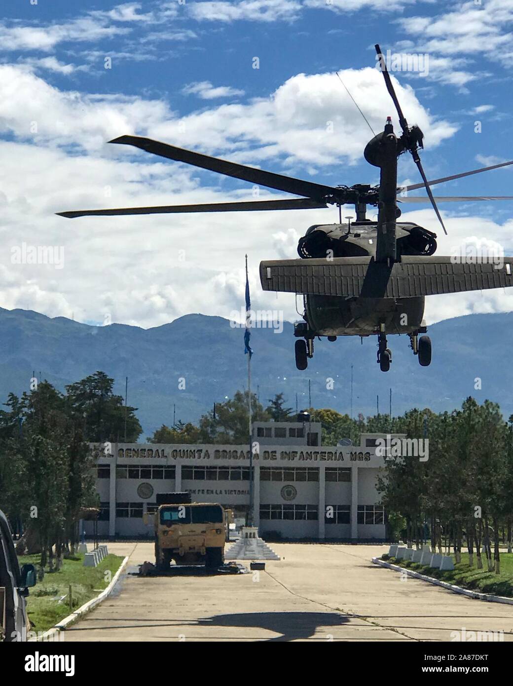 Soldiers from the 1st Battalion 183rd Assault Helicopter Battalion transport personnel in a UH-60 Black Hawk from Guatemala City to Huehuetenango Military Base, June 4. The unit deployed with approximately 150 Soldiers from the Idaho Army National Guard in support of Beyond the Horizon 2019. Stock Photo