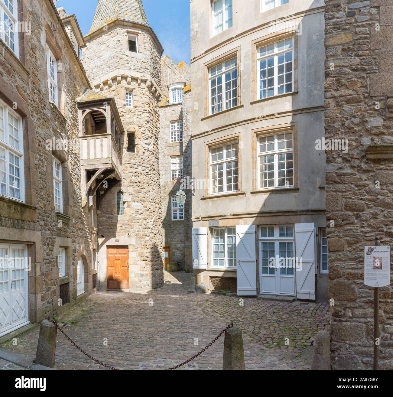 Saint-Malo, Ille-et-Vilaine / France - 19 August 2019: historic Norman stone houses in the Saint-Malo Intra-Muros Neighboorhood Stock Photo