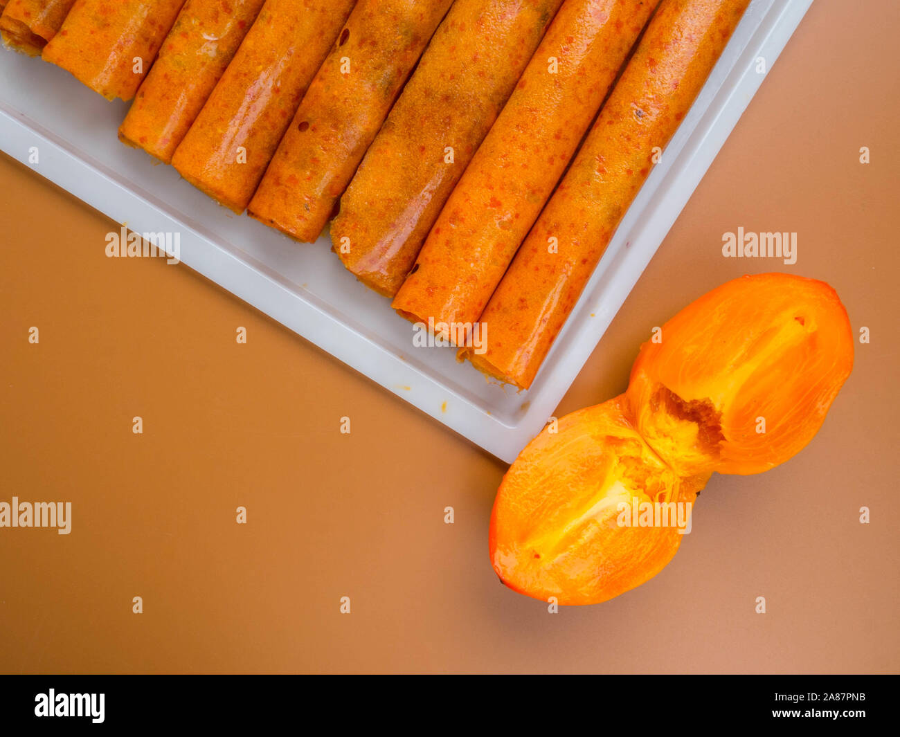 Delicious Dried Mashed Fruit Pulp From Apricot Persimmon Georgian And Armenian Cuisine Fruit Pastille From Orange Fruit And Persimmon Stock Photo Alamy Delicious Dried Mashed Fruit Pulp From Apricot Persimmon Georgian And Armenian Cuisine Fruit Pastille From Orange Fruit And Persimmon Stock Photo Alamy