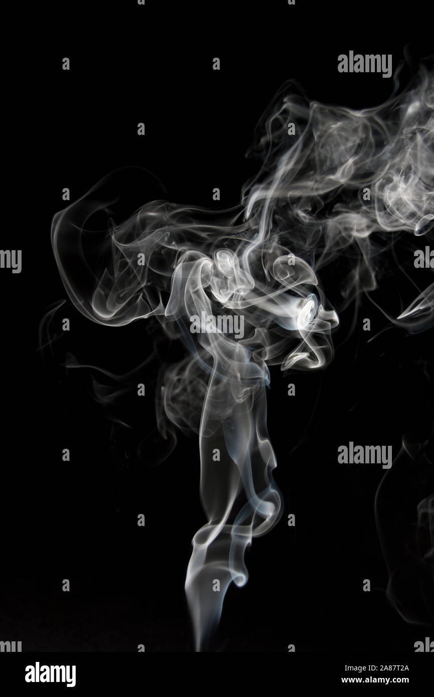 Pure smoke isolated on a black background Stock Photo - Alamy