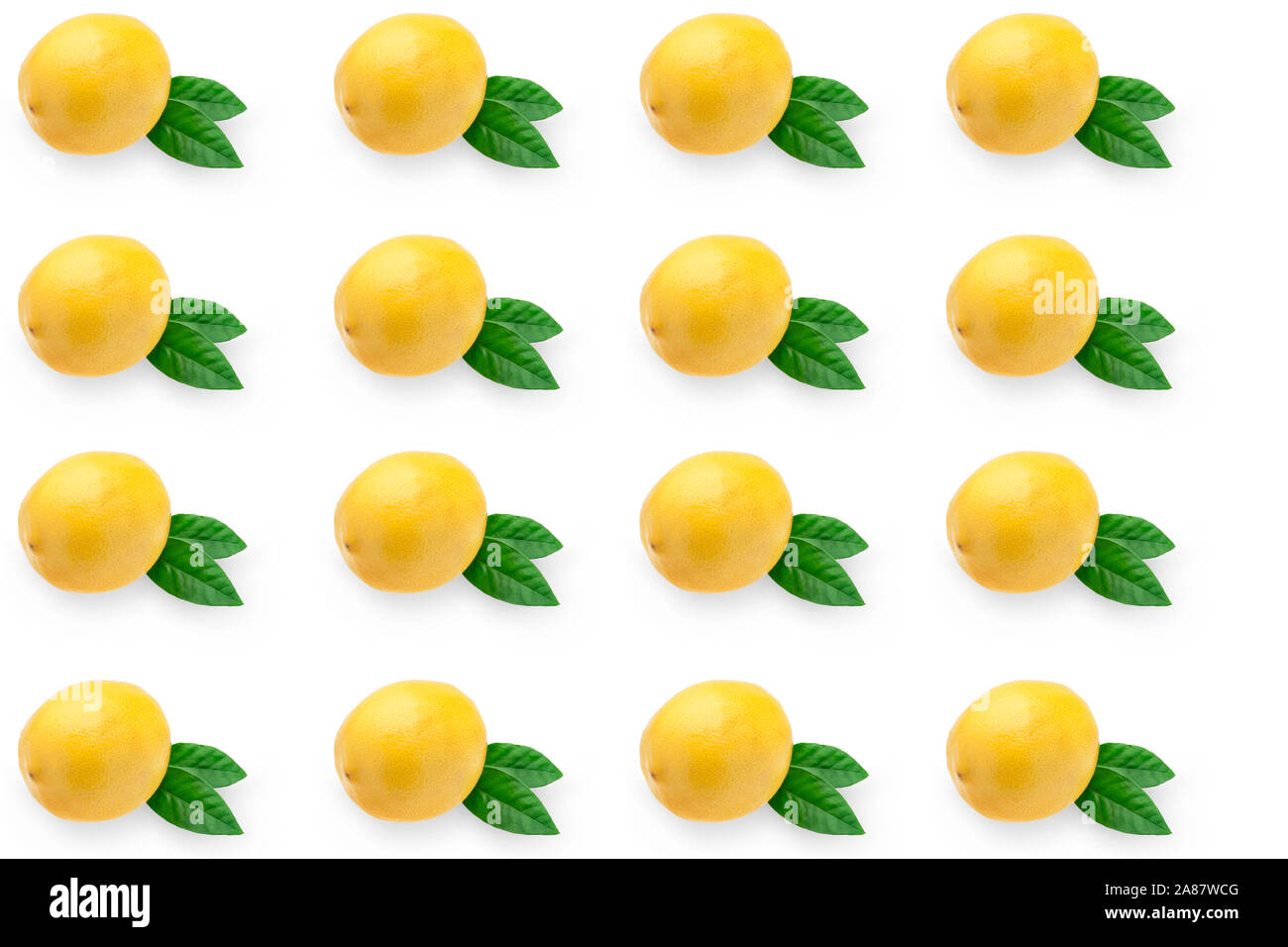 Creative layout made of lemon and leaves. Flat lay. Food concept. Lemon on white background Stock Photo