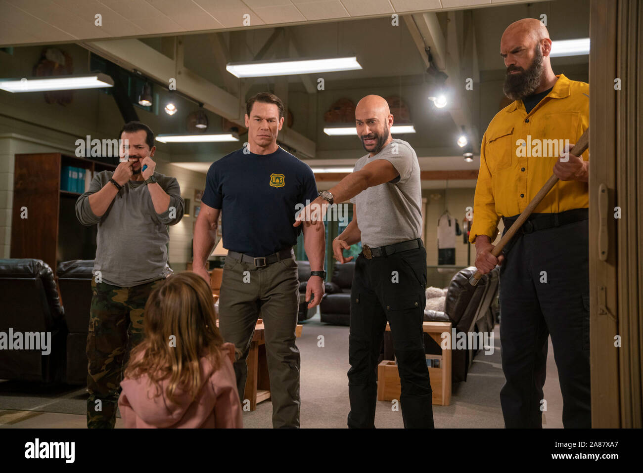 RELEASE DATE: November 8, 2019 TITLE: Playing With Fire STUDIO: Paramount Pictures DIRECTOR: Andy Fickman PLOT: A crew of rugged firefighters meet their match when attempting to rescue three rambunctious kids. STARRING: John Leguizamo, Finley Rose Slater (back to camera), John Cena, Keegan-Michael Key, and Tyler Mane. (Credit Image: © Paramount Pictures/Entertainment Pictures) Stock Photo