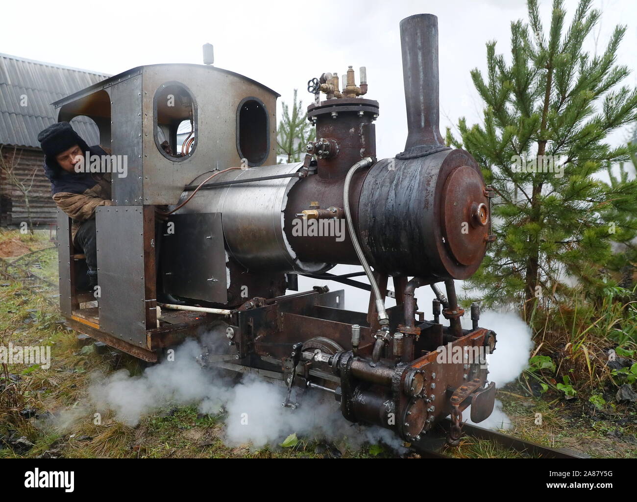 Leningrad Region Russia November 3 19 Railway Depot Worker Sergei Terekhov Rides A Miniature Steam Locomotive Which He And Retired Engineer Pavel Chilin Not Pictured Built On Their Own Within 8