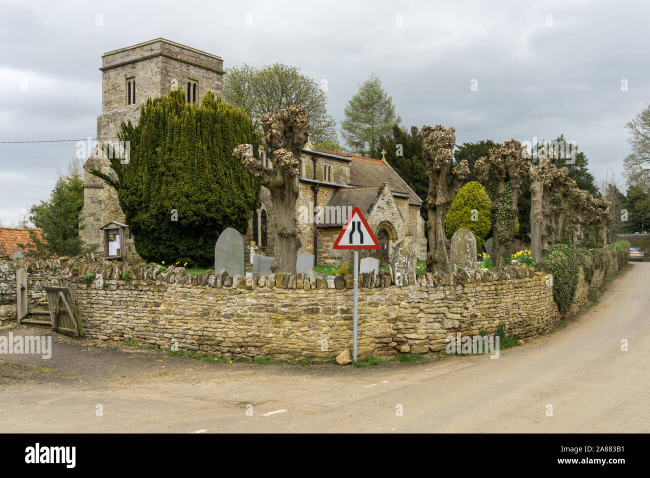 Parish church of St Catherine in the village of Draughton, Northamptonshire, UK; earliest parts date from the late 12th century. Stock Photo