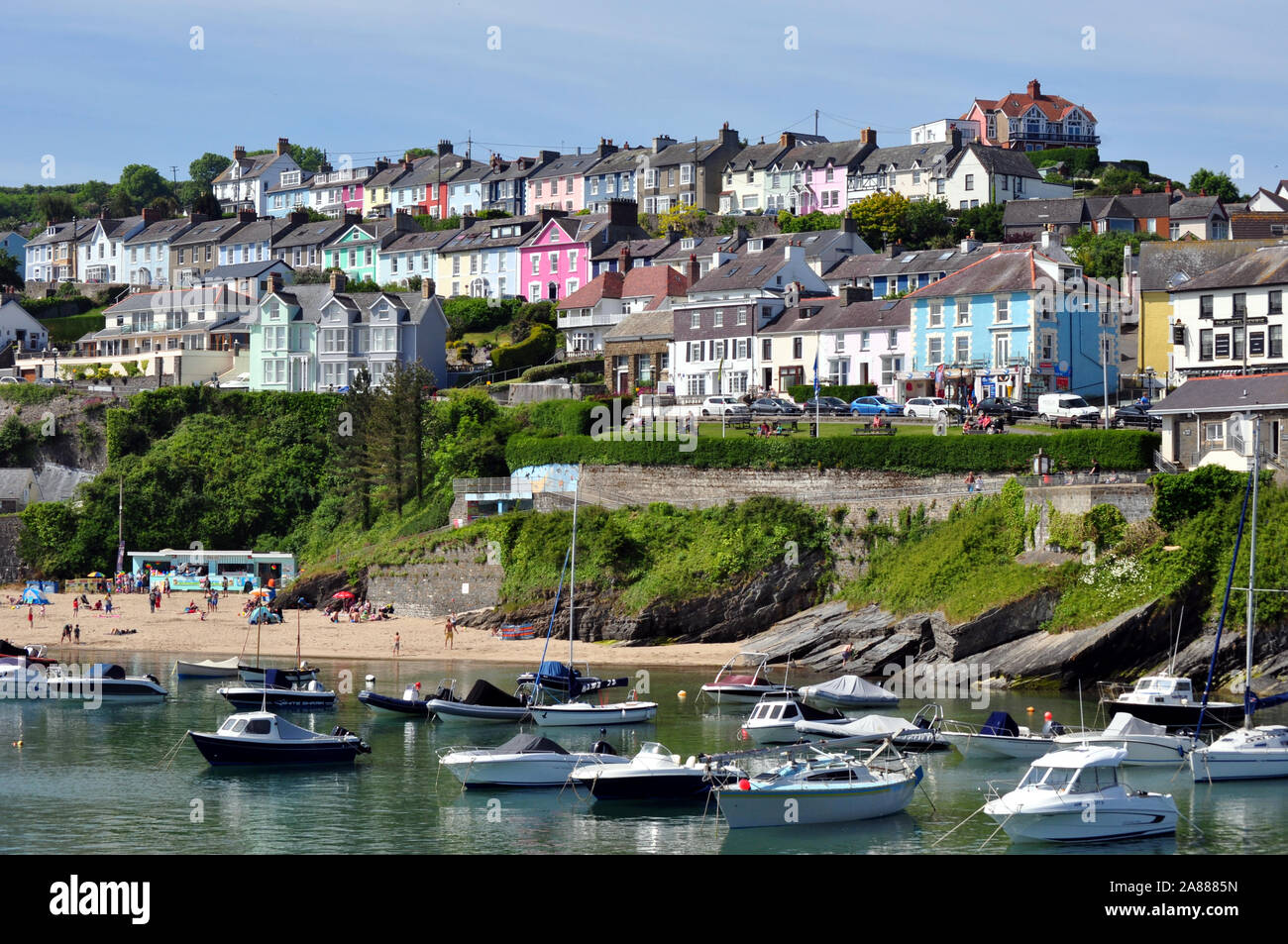 a view of the picturesque seaside town of New Quay Wales looking up to