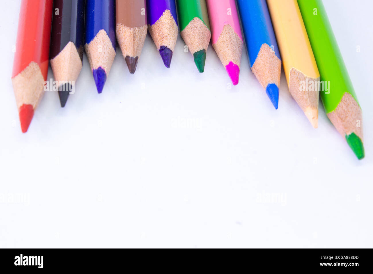 Close up picture of many colored pencil crayons on white background.  Assortment of sharpened colored pencils/ Colored drawing pencils. Selective  focu Stock Photo - Alamy