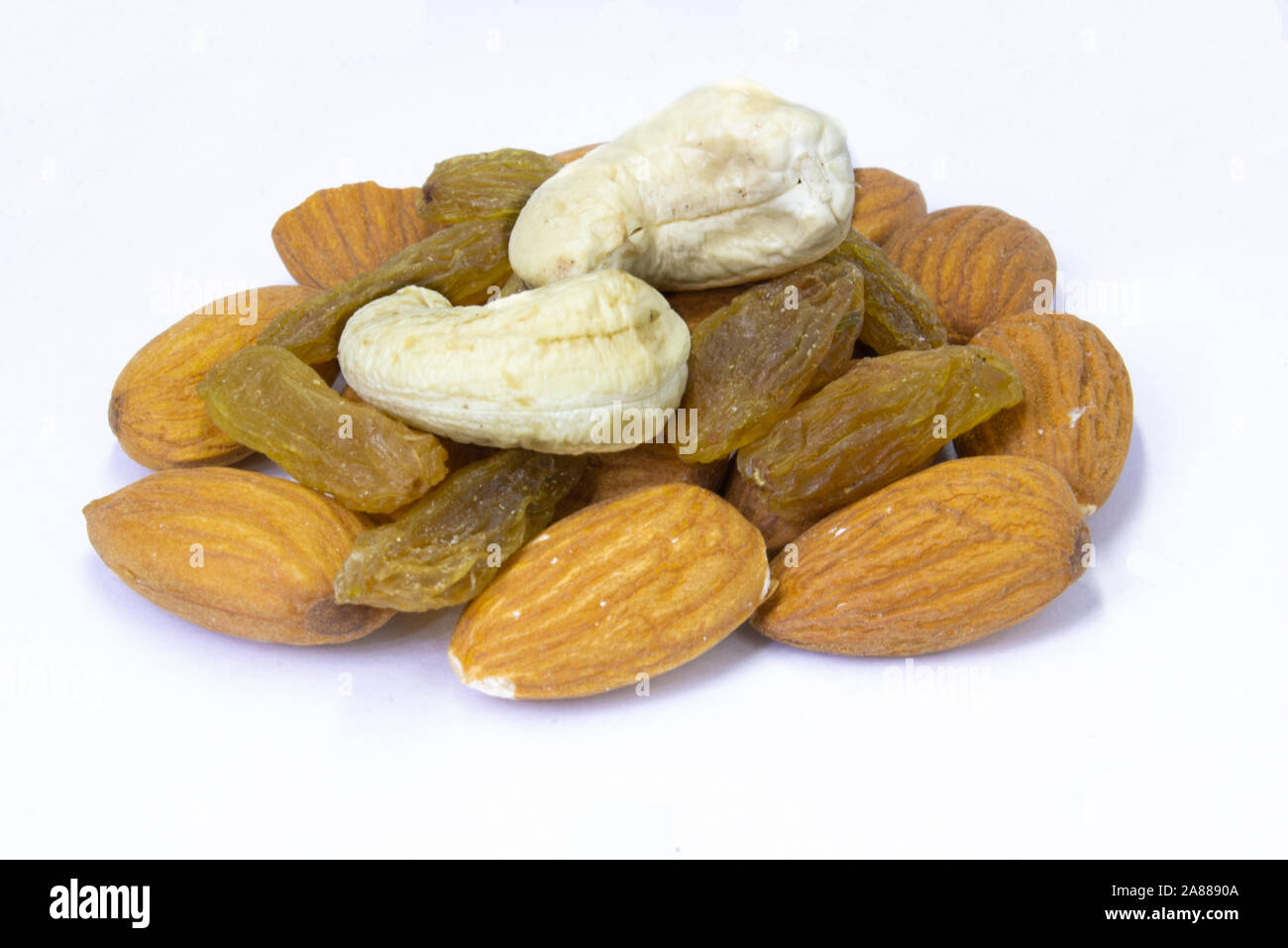 Combination of cashew nuts, almonds nuts and raisins, healthy snack