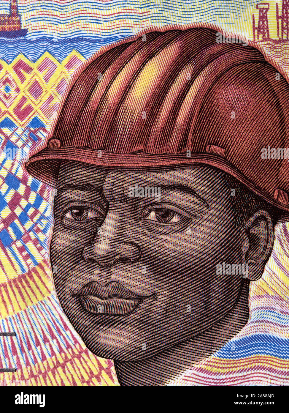 Portrait of oil rig worker from old Central African money Stock Photo