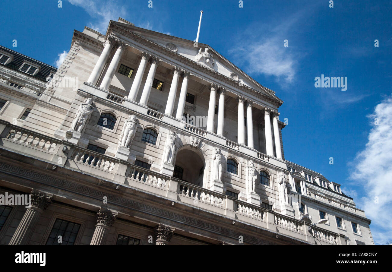 The Bank of England, London. Low angle view looking up at the facade of the Bank of England in the financial City of London district. Stock Photo