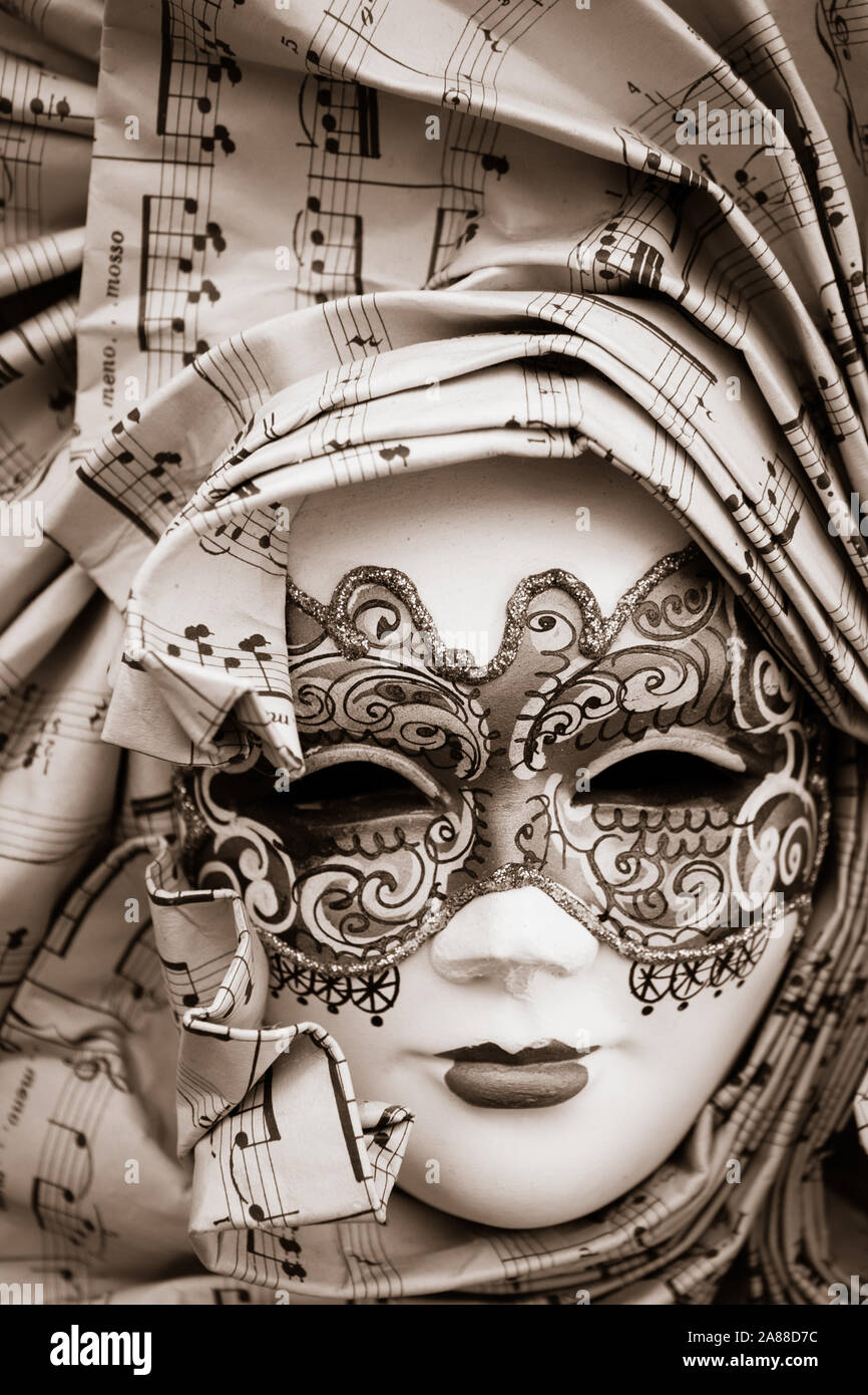 Venetian Mask with music. Close detail of a traditional mask as worn at the  famous Carnival in Venice, Italy Stock Photo - Alamy