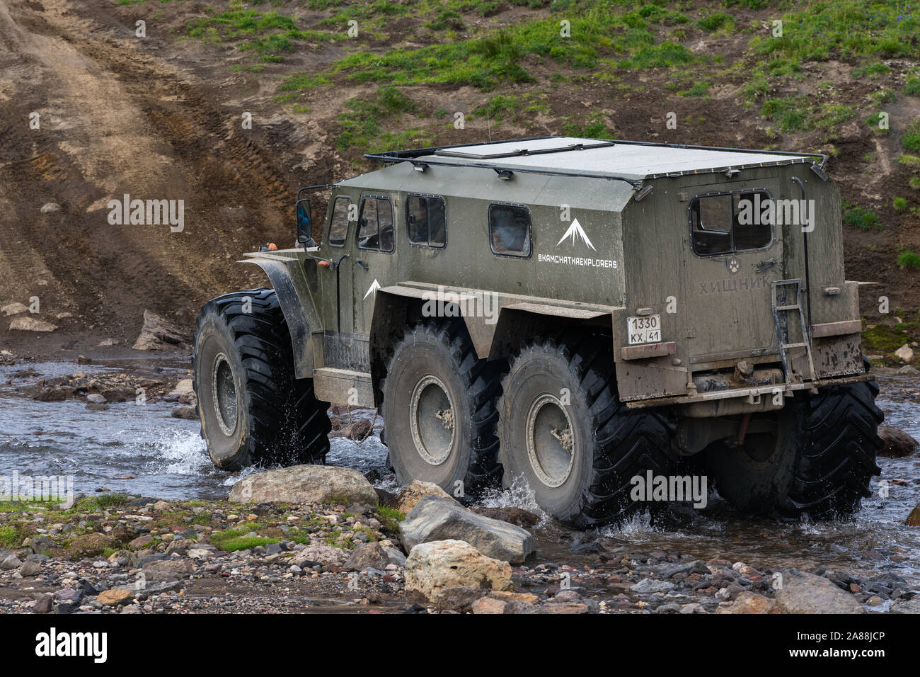 Snow and swamp extreme off-road, all-terrain vehicle Predator  transportation travelers and tourists in most difficult, harsh conditions -  driving on m Stock Photo - Alamy